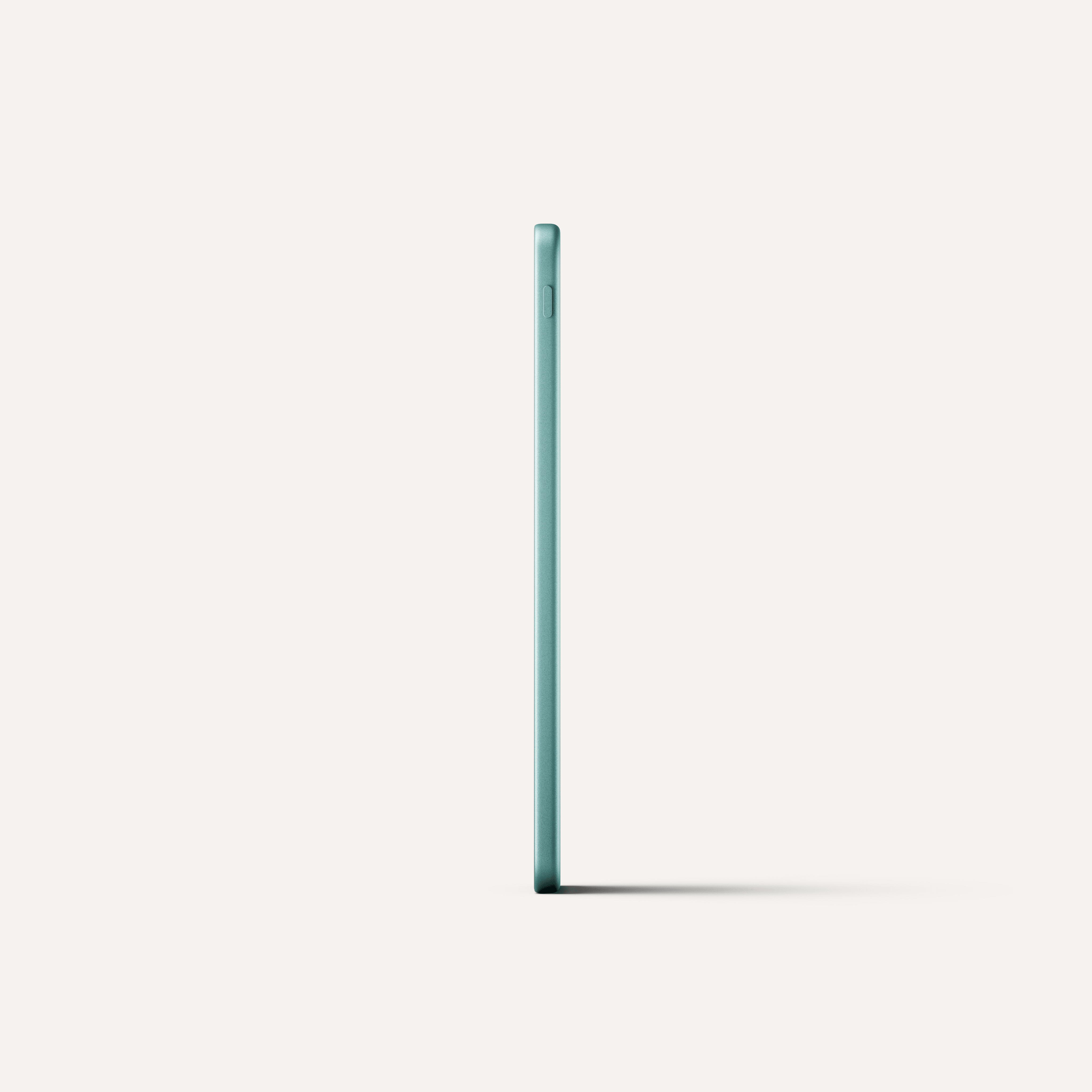 Amazon Kindle e-reader with rounded corners and power button on bottom edge, shown in teal.