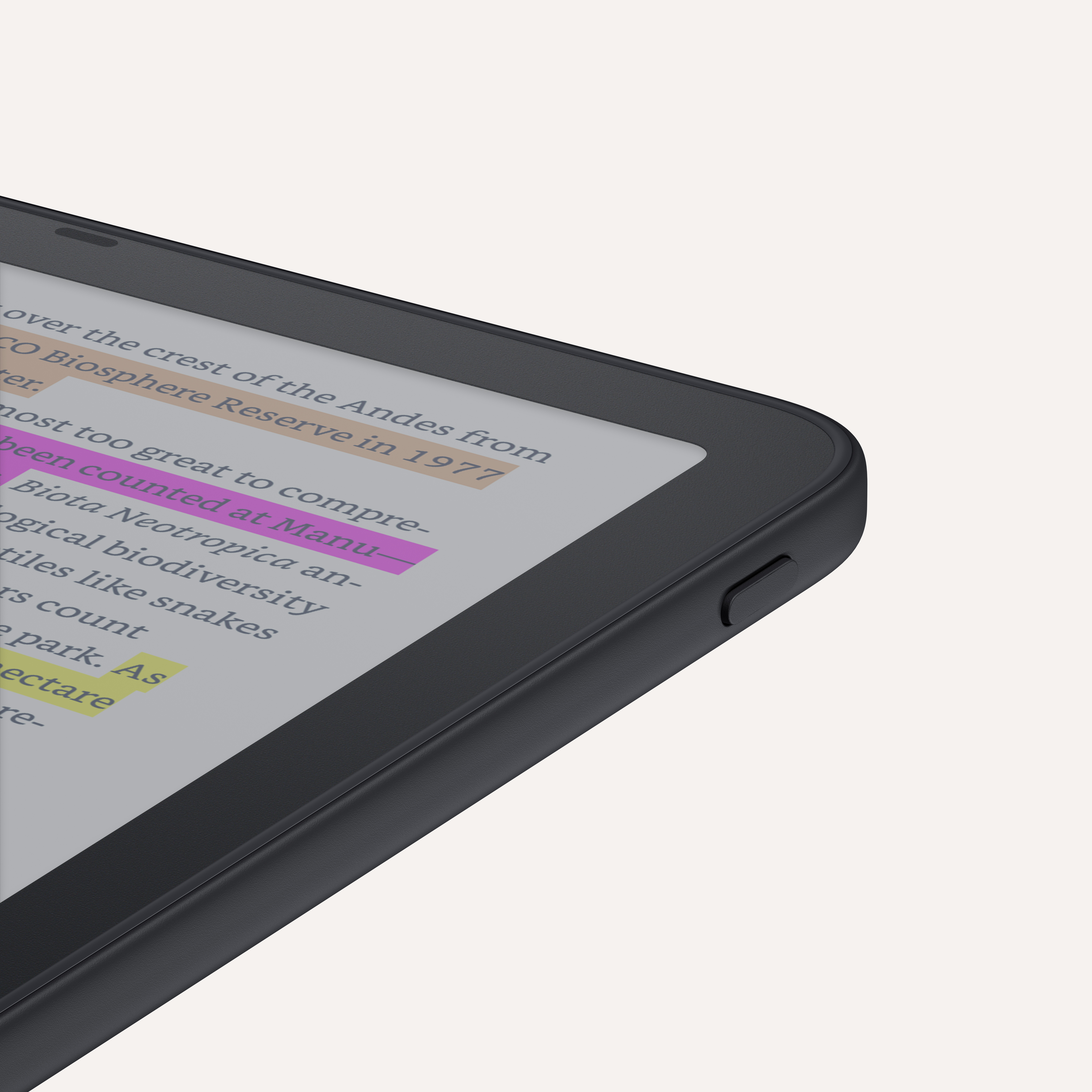 Amazon Kindle e-reader with rounded corners and a power button on the bottom edge, displaying a colorful book cover.