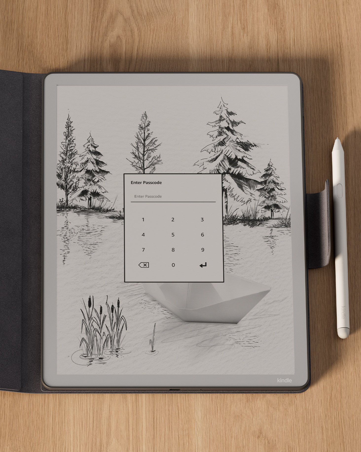Kindle Scribe e-reader displaying a lock screen with pine tree sketch artwork and a paper boat. Text reads: "Enter Passcode" with a numeric keypad. A stylus is beside the device on a wooden surface.